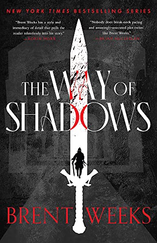 Cover art for The Way of Shadows. It's a dark cover with shades of gray. The title is in white, and there's a white silhouette of a dagger. The darkened figure of a man with a sword is at the very center.Picture